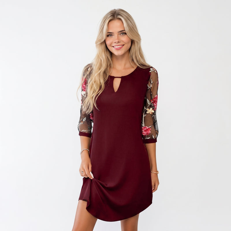 Felina | Elegante minivestido con mangas transparentes