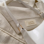Bolso de Hombro Baguette en Charol