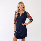 Felina | Elegante minivestido con mangas transparentes