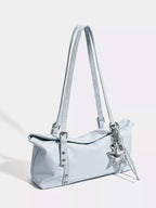 Bolso Elara de hombro en acabado piel con charm estelar